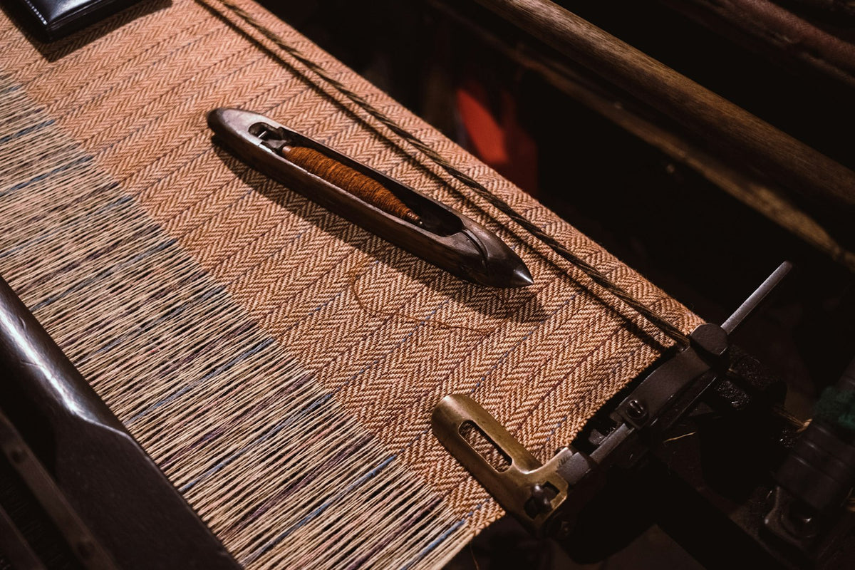 Close-up of brown woven tweed cloth