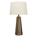 Antique brass table lamp with textured conical base and cream shade