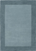 Duck egg blue wool rug with a quiet border