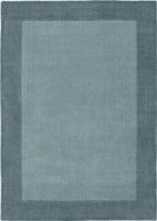 Duck egg blue wool rug with a quiet border