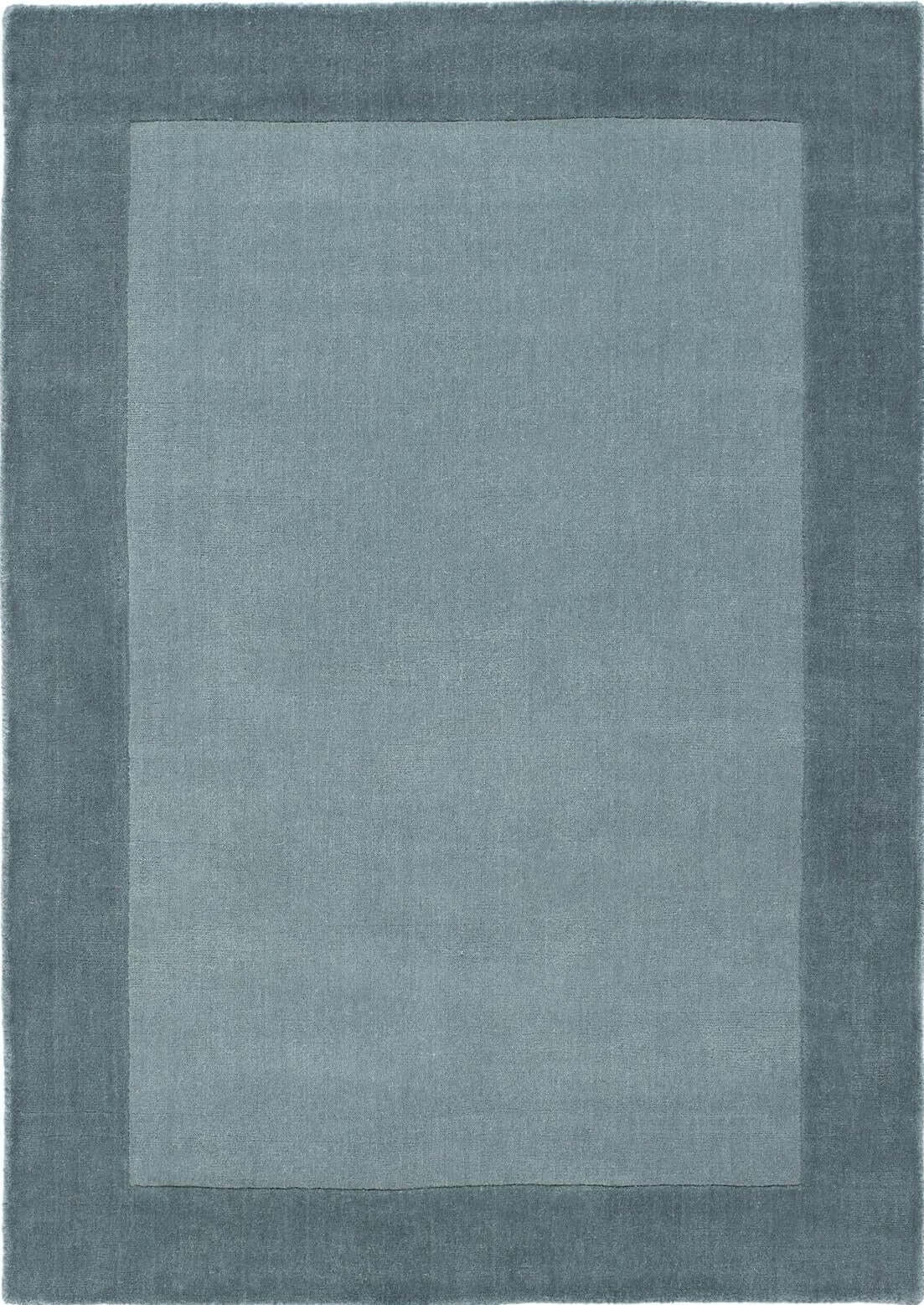 Duck egg blue wool rug with a quiet border