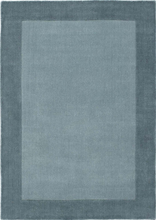 Duck egg blue wool rug with a quiet border