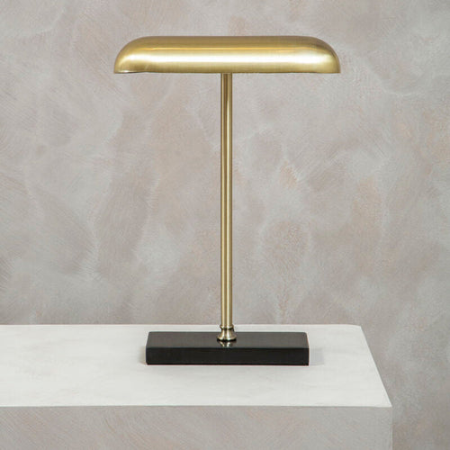 Brass desk lamp with a black marble base