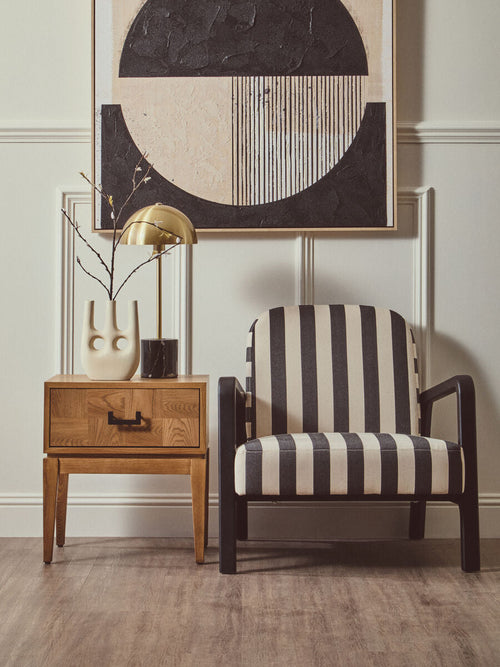 Brushed brass dome lamp on a side table