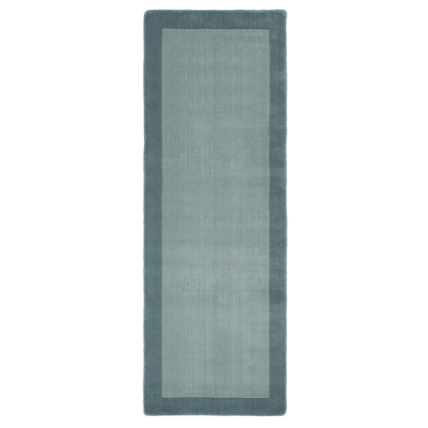 Close view of the duck egg blue wool pile and border