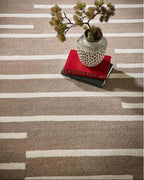 Broken stripe wool rug in a sitting room