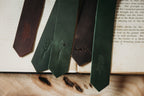 Engraved leather bookmarks with rose, fern, wildflower and mountain designs