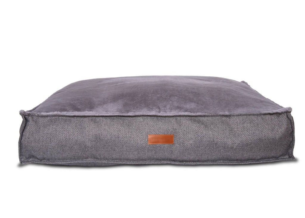 Grey herringbone flat pillow dog bed with faux fur surface